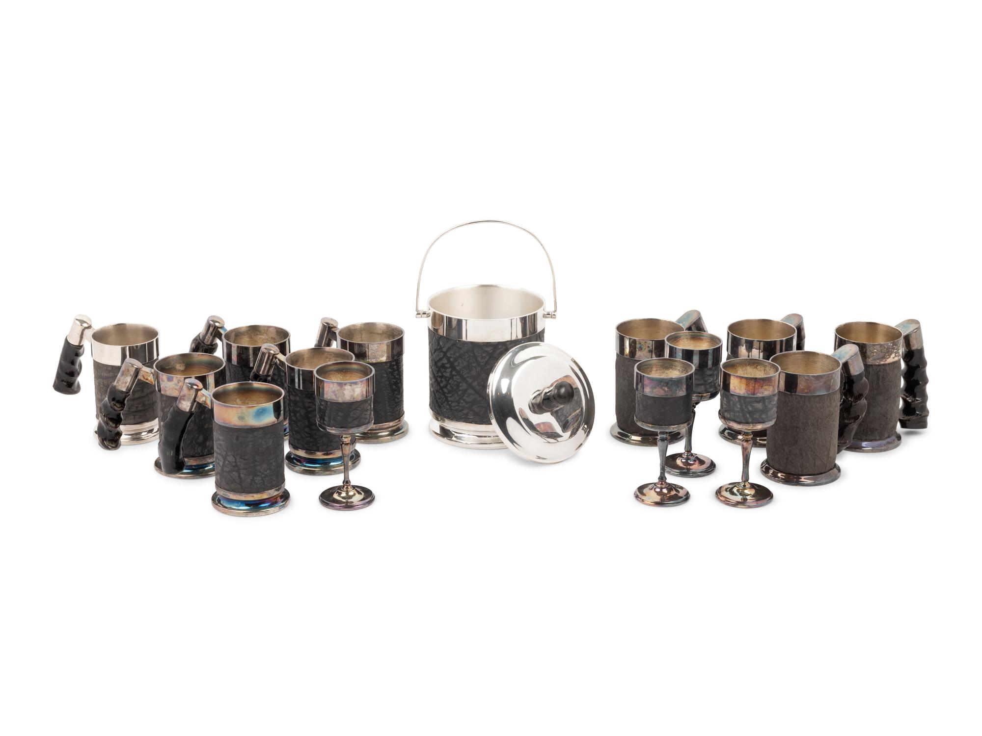 A Set of Silver-Plate and Hide Drinkware