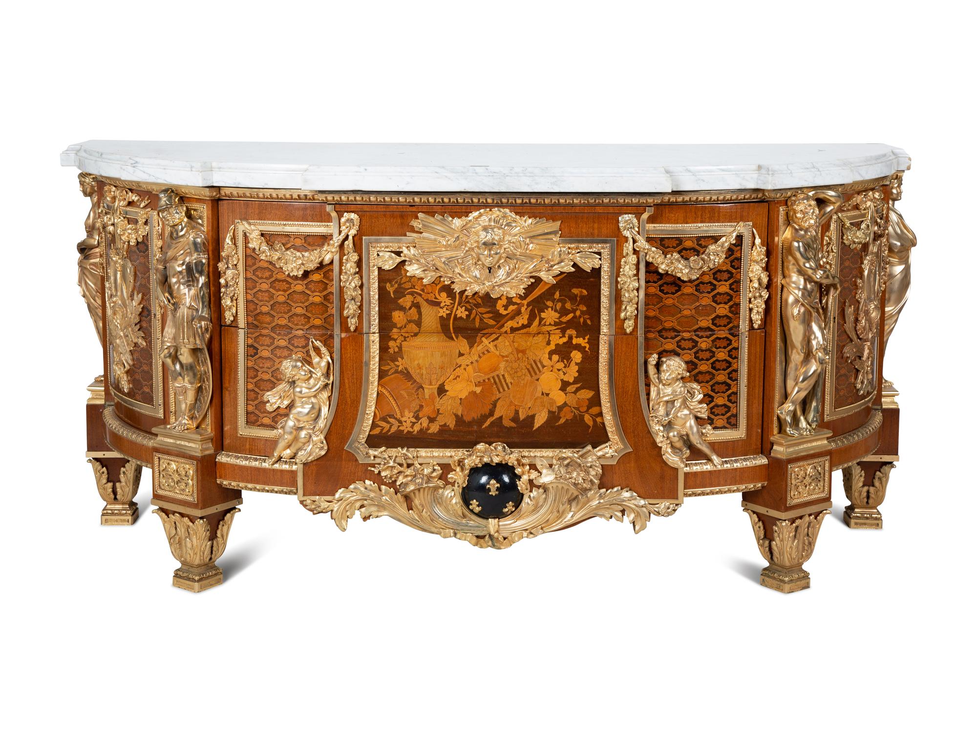 A Louis XVI Style Gilt Bronze Mounted Marquetry Marble-Top Commode After the Model by Jean-Henri Riesener — FIRST HALF 20TH CENTURY