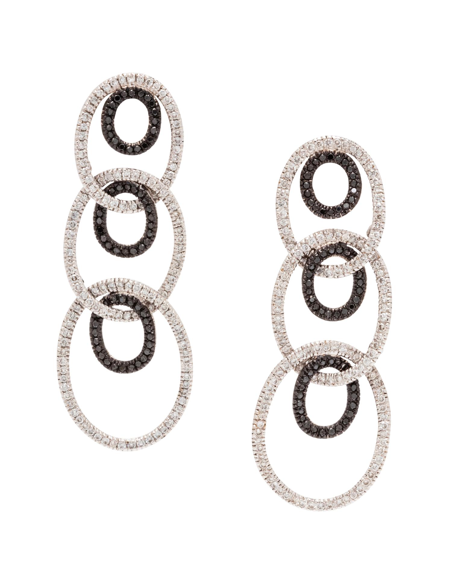 A Pair of 18 Karat White Gold, Diamond and Black Diamond Earrings,