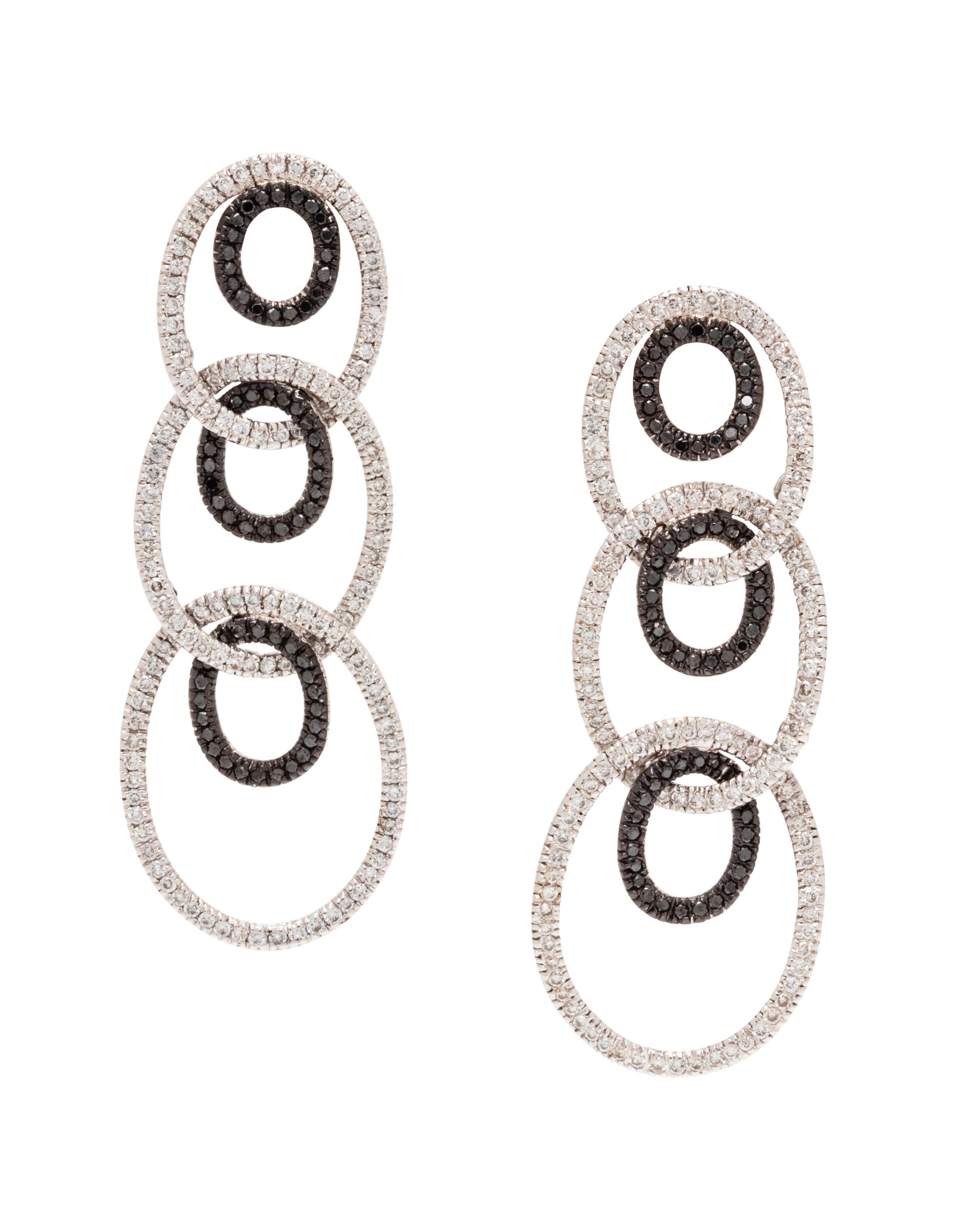 A Pair of 18 Karat White Gold, Diamond and Black Diamond Earrings,