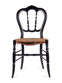 [LINCOLN ASSASSINATION]. An ebonized wooden chair purportedly used at Ford's Theatre during the performance of Our American Cousin , 14 April 1865.