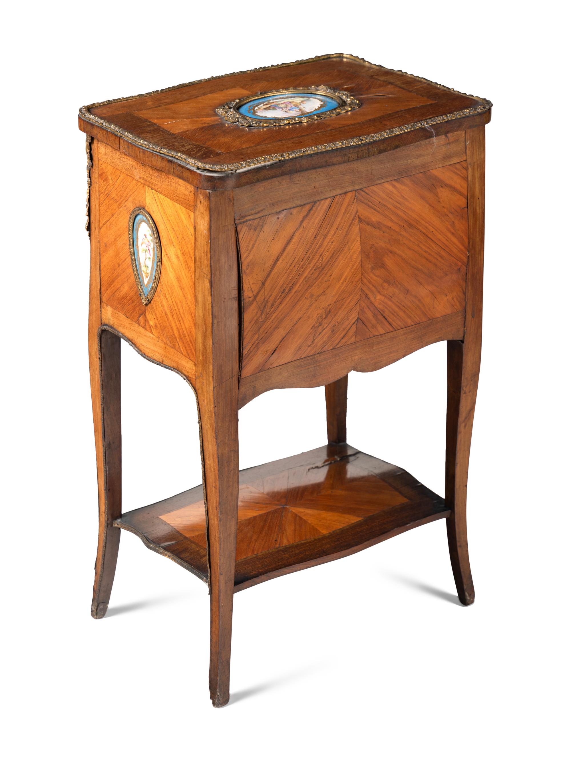 A Louis XV Style Chiffonier with Porcelain Inset Plaques