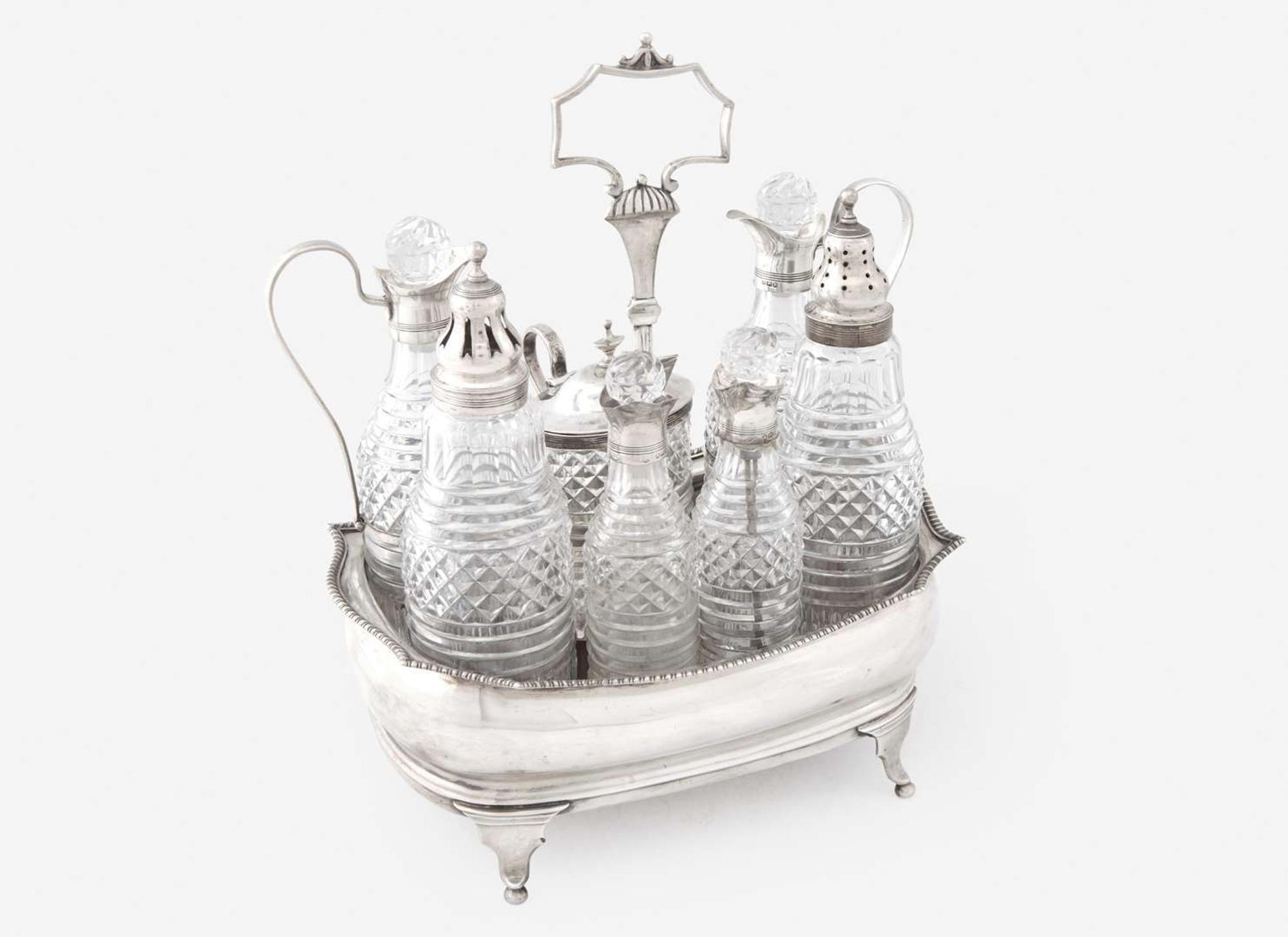 A George III sterling silver-mounted glass cruet set, Charles Chesterman II, London, 1812