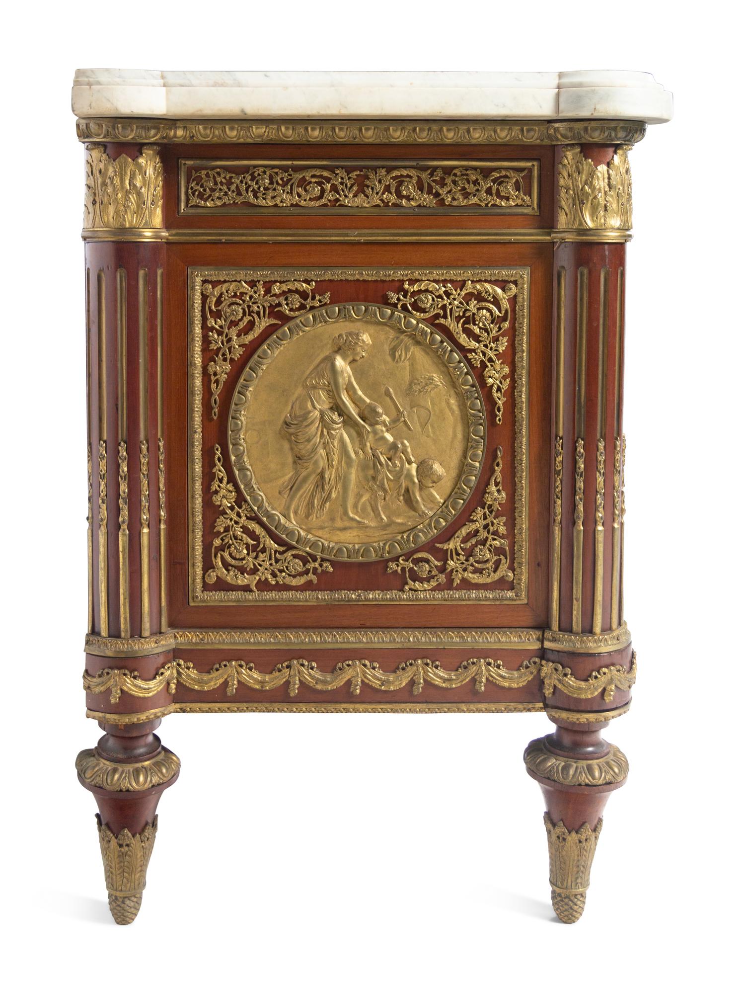 A Louis XVI Style Gilt Bronze Mounted Marble-Top Commode à Vantaux After the Model by Guillaume Benneman