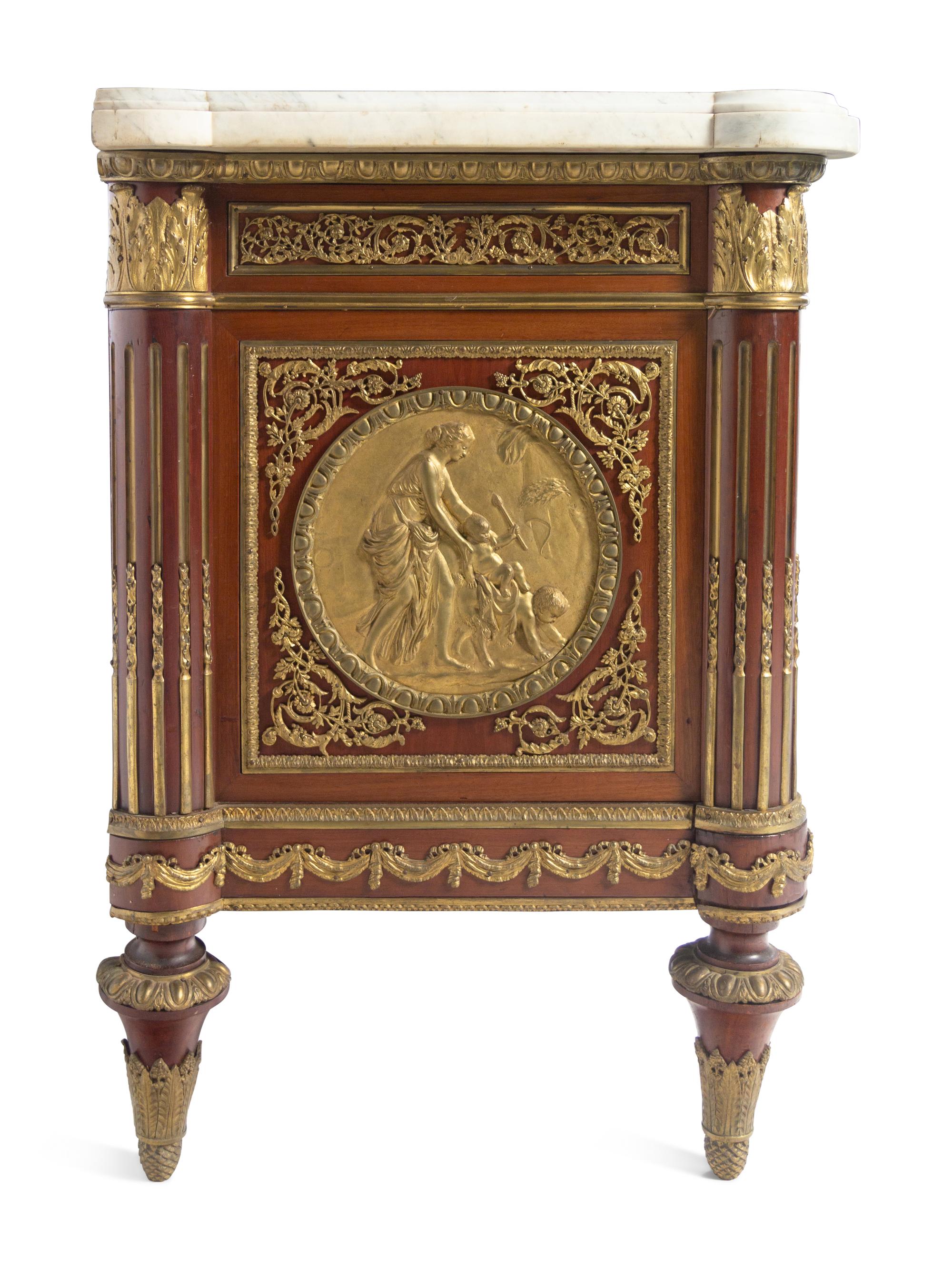 A Louis XVI Style Gilt Bronze Mounted Marble-Top Commode à Vantaux After the Model by Guillaume Benneman