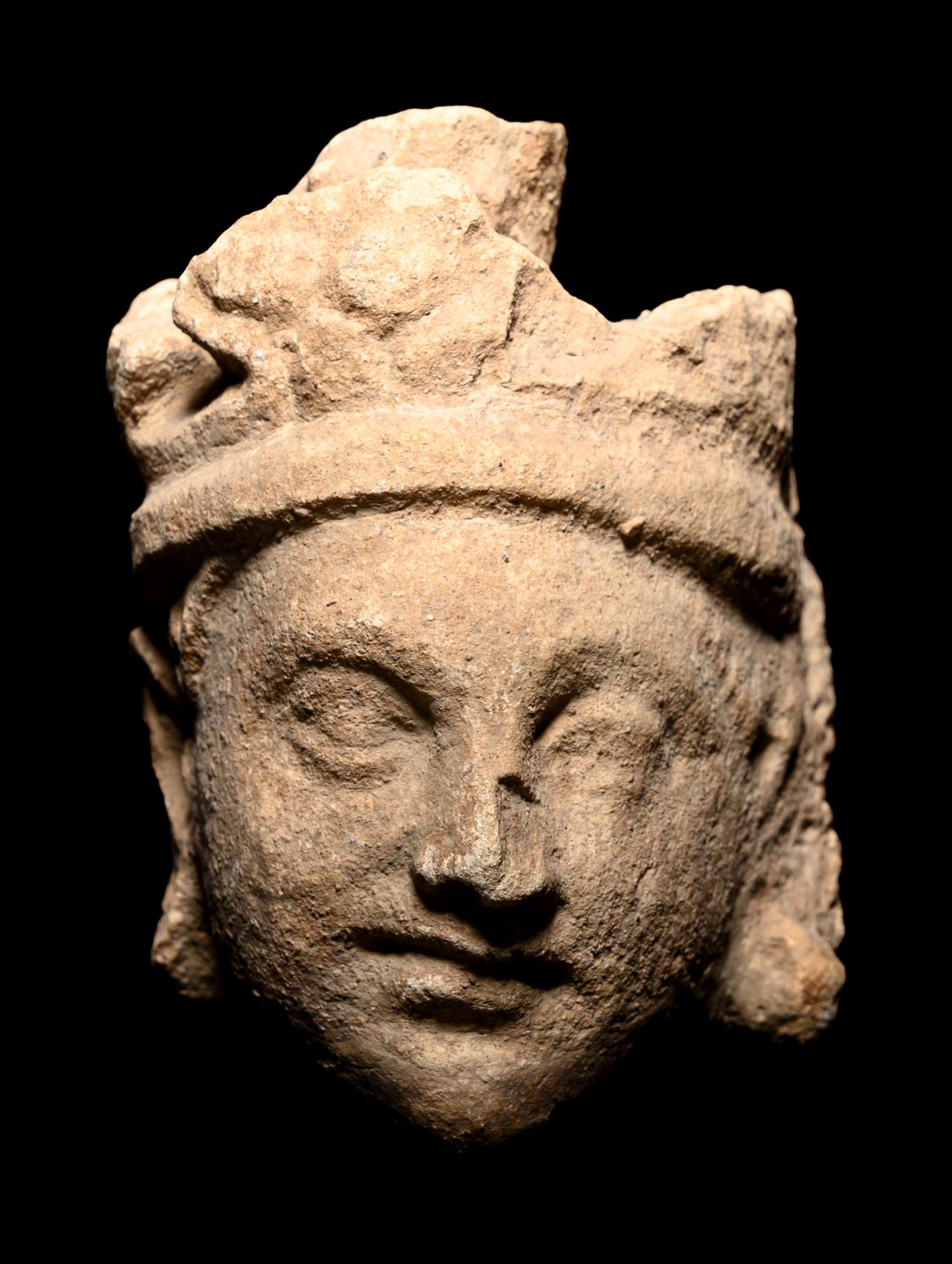Three Gandharan Fragmentary Stucco Heads and One European Fragmentary Stucco Head