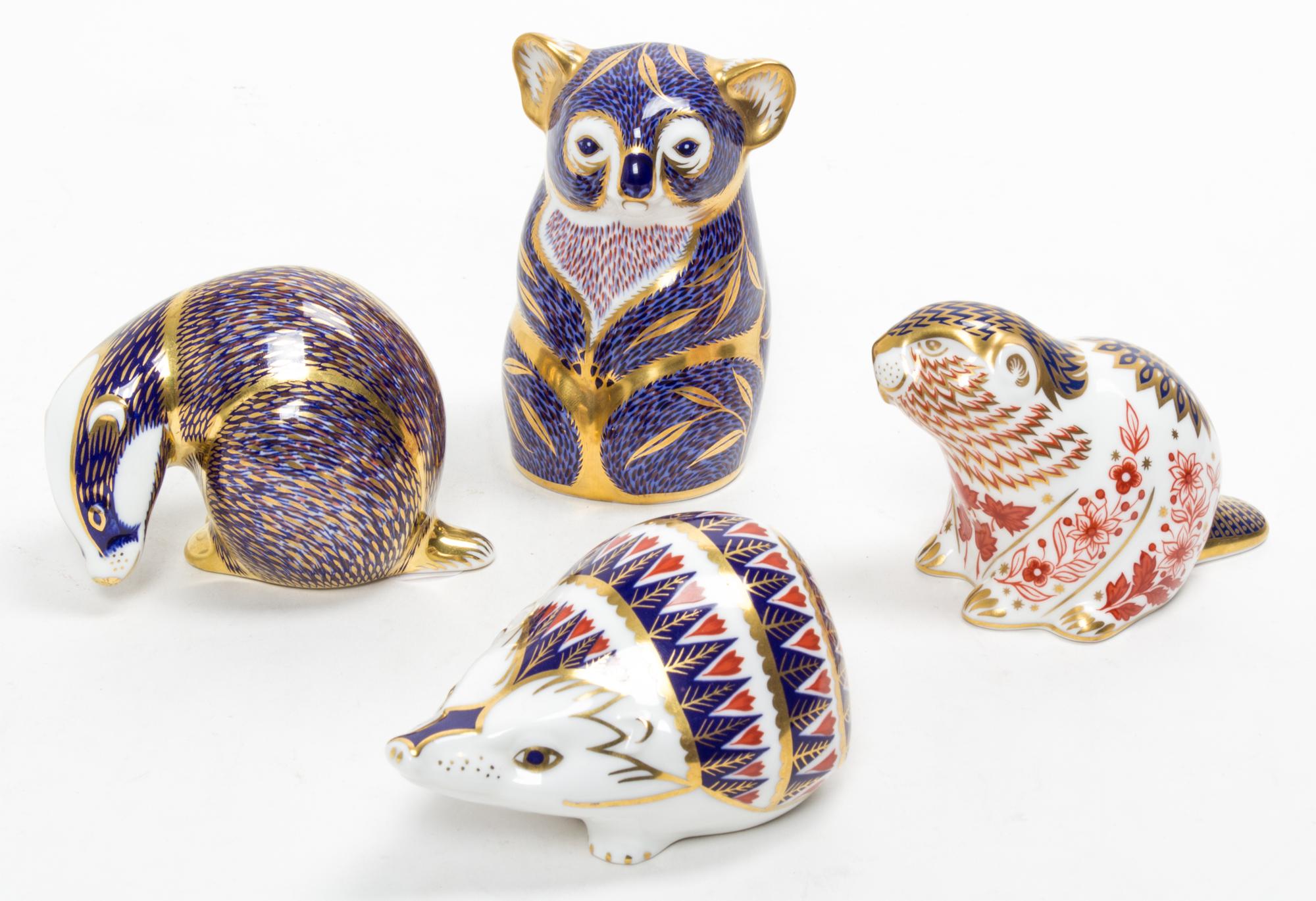 A Collection of Royal Crown Derby Porcelain Figural Paperweights Height of tallest 4 1/2 inches. — LATE 20TH CENTURY