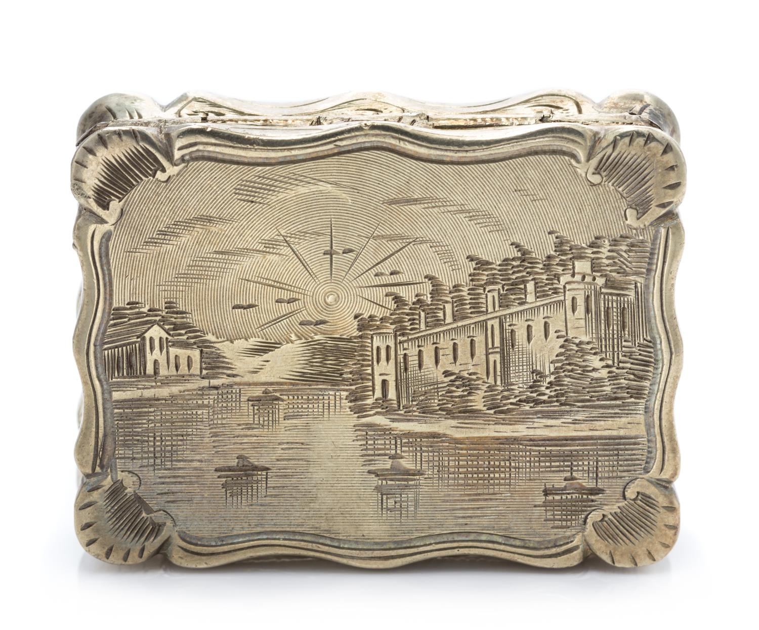 A Victorian Silver-Gilt Vinaigrette, Edward Smith, Birmingham, 1847, the lid decorated with a river scene, the underside centered by a