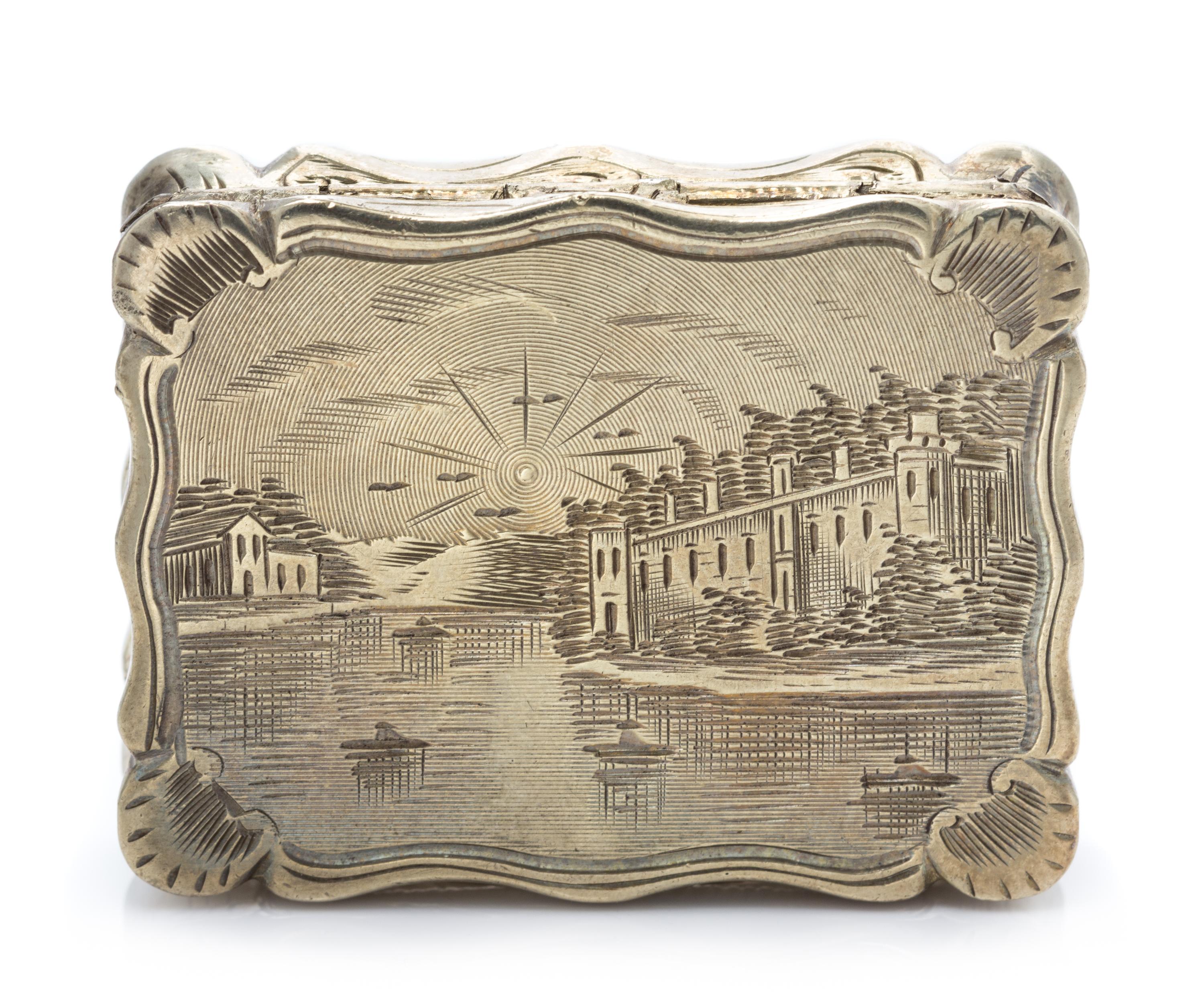 A Victorian Silver-Gilt Vinaigrette, Edward Smith, Birmingham, 1847, the lid decorated with a river scene, the underside centered by a