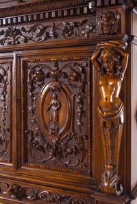 A Renaissance Revival Carved Walnut Cabinet on Stand