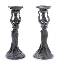 A Pair of Art Nouveau Cast Metal Figural Candlesticks