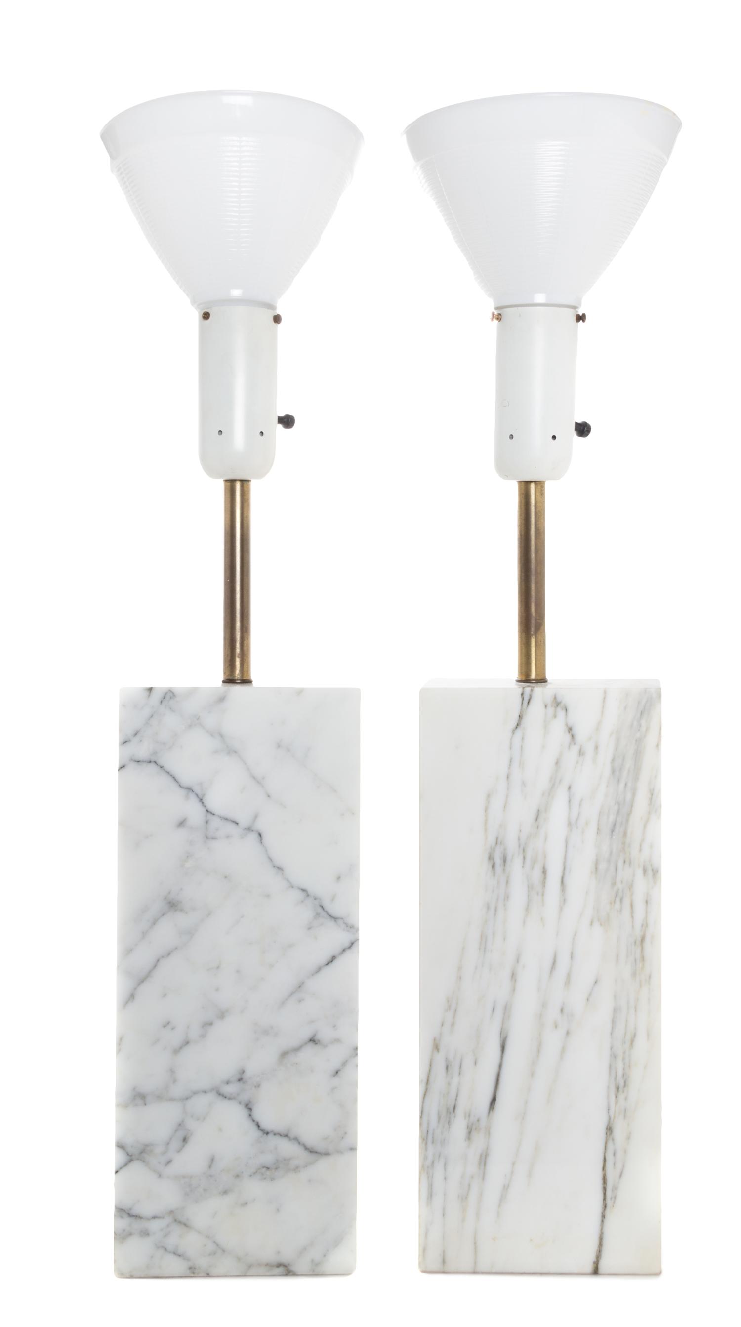 A Pair of Marble Table Lamps Height 35 1/4 inches (with shade).