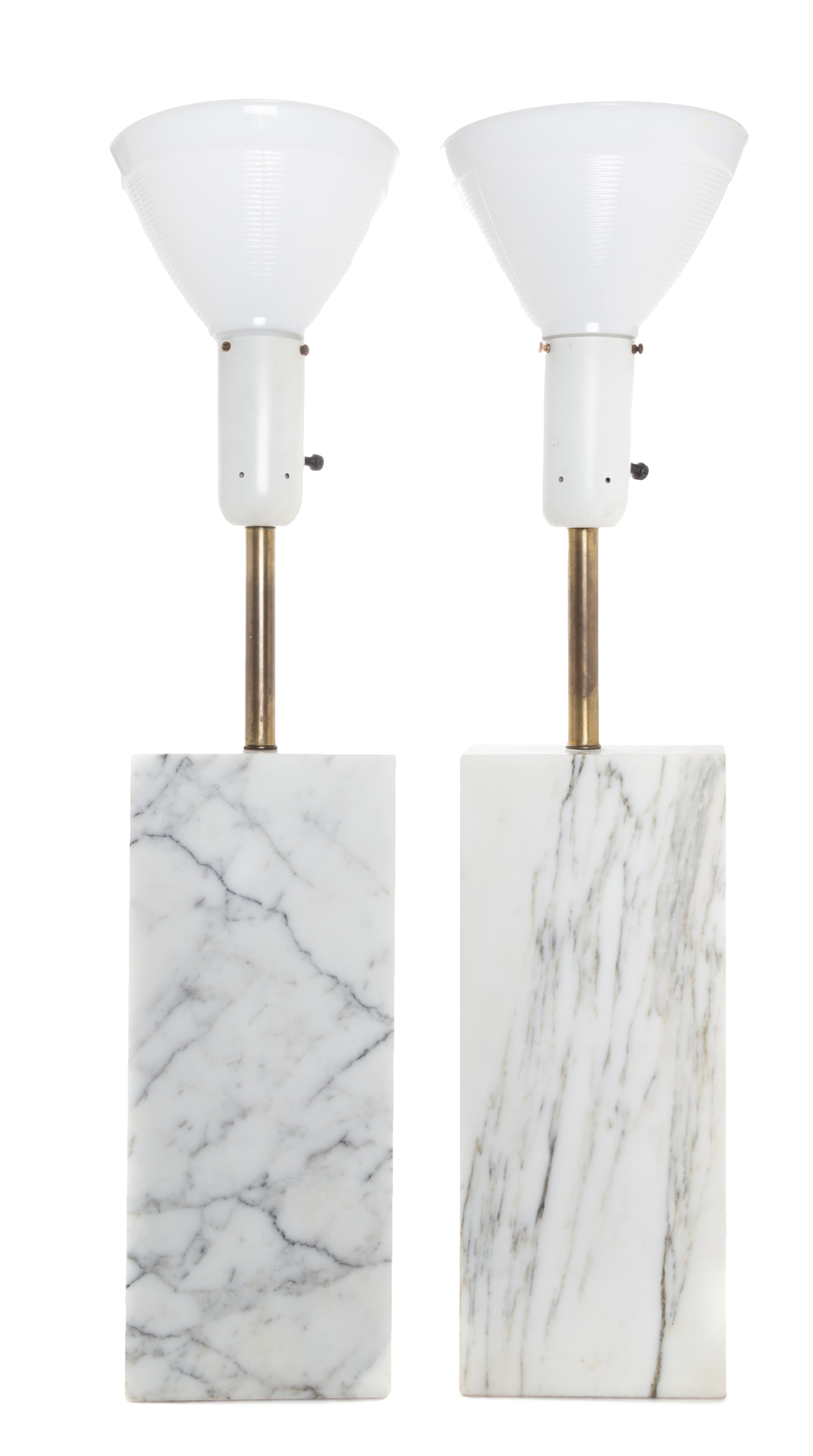 A Pair of Marble Table Lamps Height 35 1/4 inches (with shade).