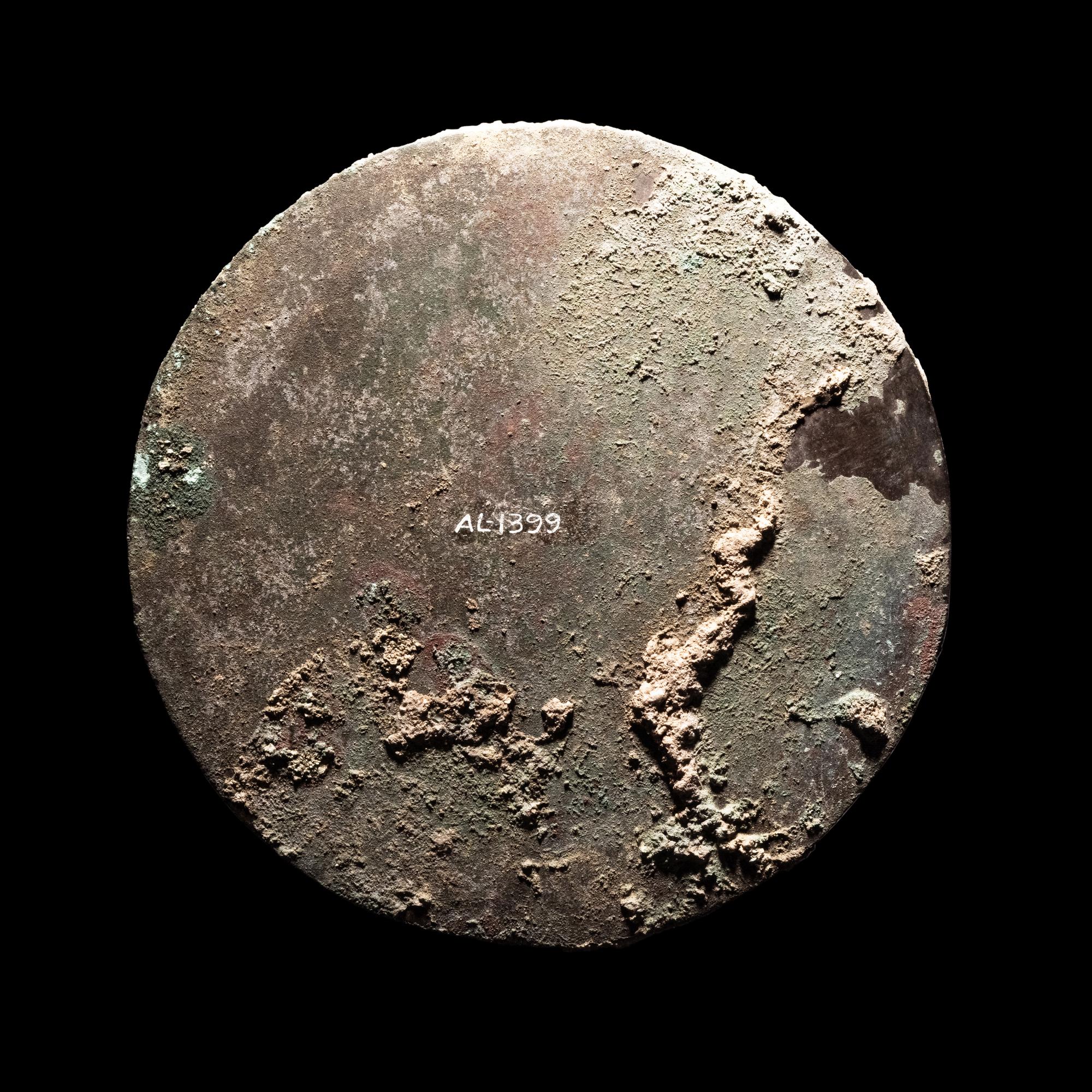 Two Greek Bronze Mirrors