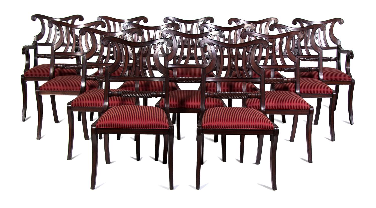 A Set of Fourteen Regency Style Mahogany Dining Chairs Height 38 inches.