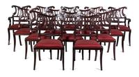 A Set of Fourteen Regency Style Mahogany Dining Chairs Height 38 inches.