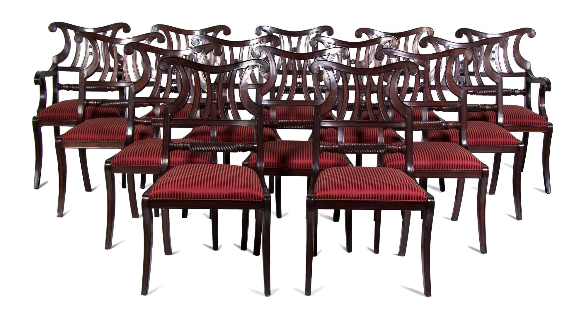 A Set of Fourteen Regency Style Mahogany Dining Chairs Height 38 inches.