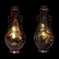 A Pair of Japanese Gilt Highlighted Bronze Handled Vases