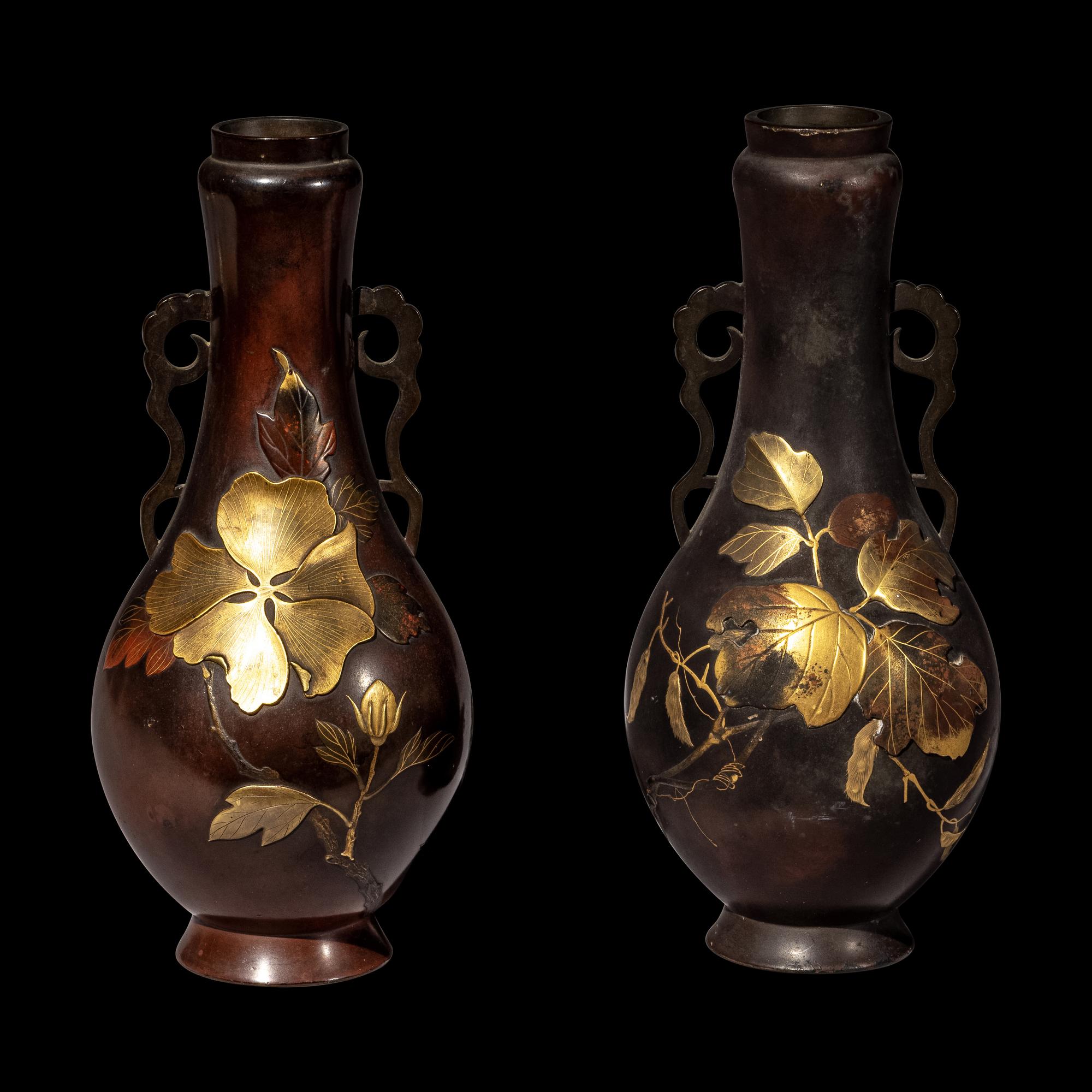 A Pair of Japanese Gilt Highlighted Bronze Handled Vases