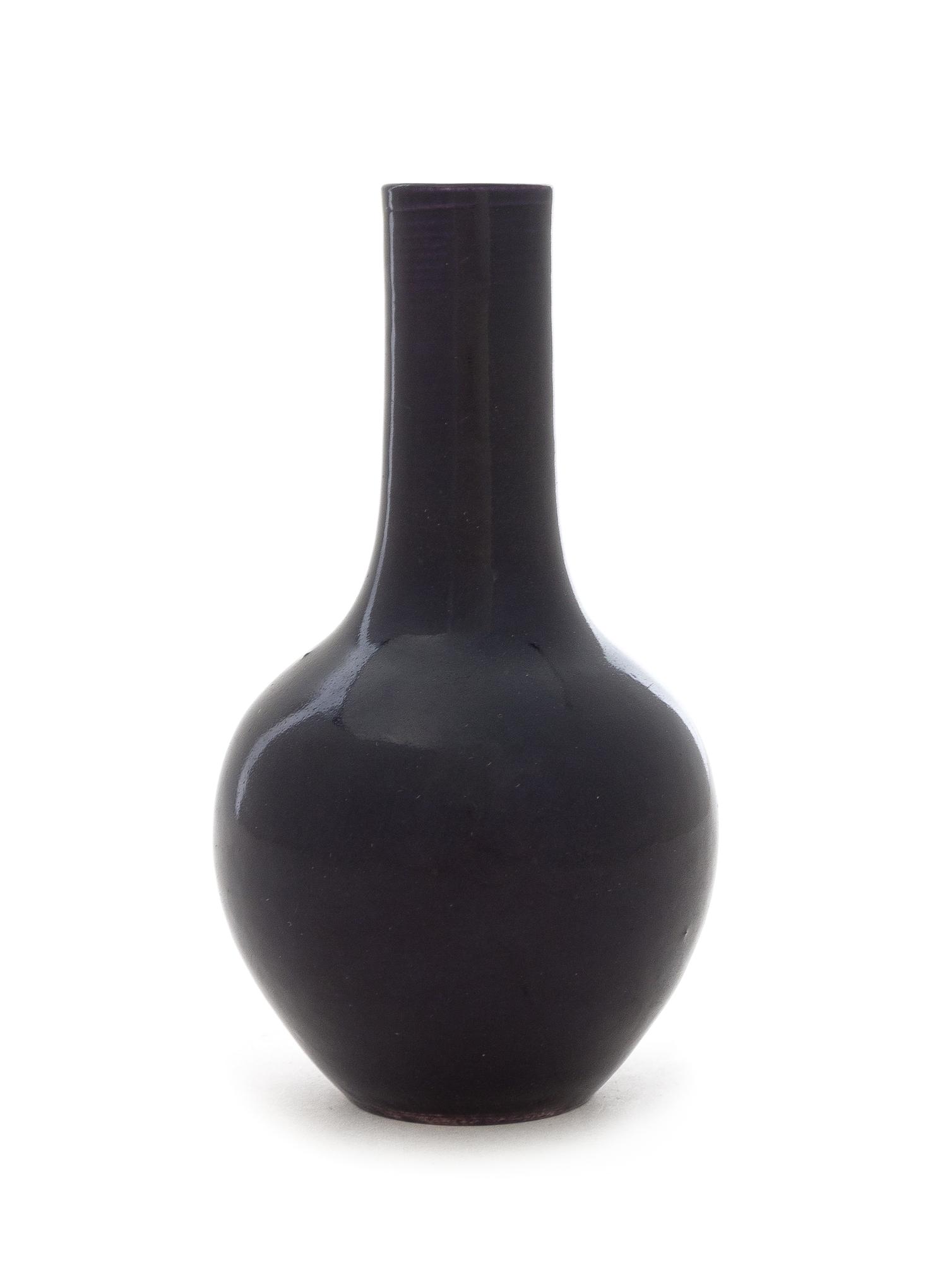 A Chinese Dark Aubergine Glazed Porcelain Bottle Vase Height 5 1/2 inches. — 19TH CENTURY