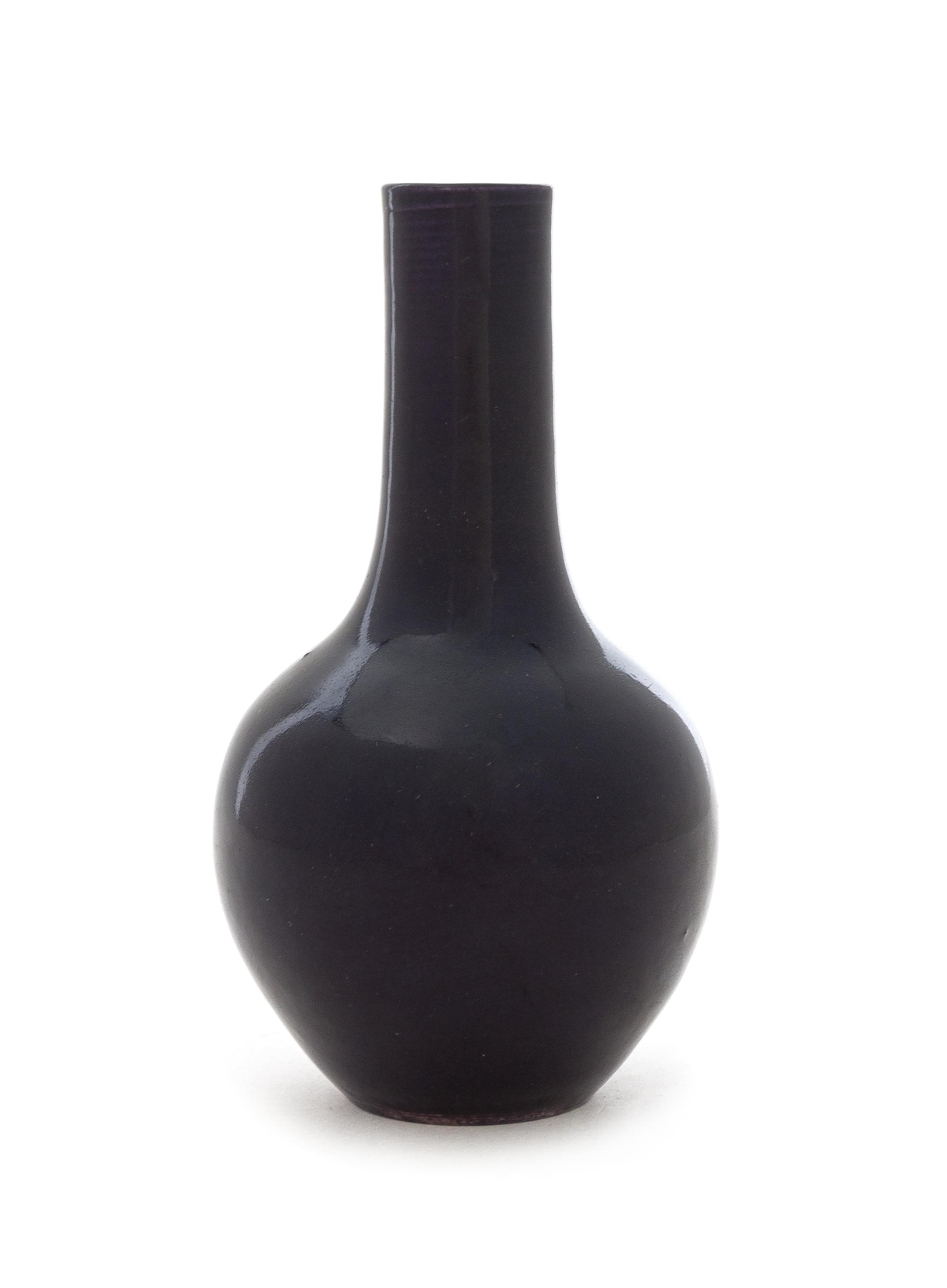 A Chinese Dark Aubergine Glazed Porcelain Bottle Vase Height 5 1/2 inches. — 19TH CENTURY