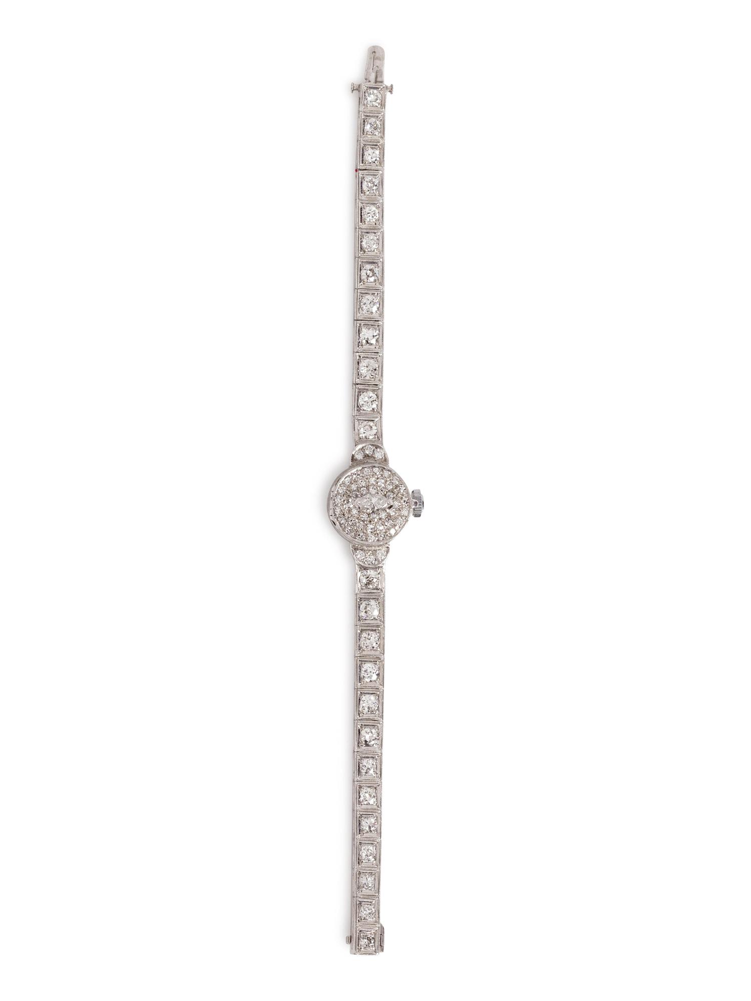 A 14 Karat White Gold and Diamond Surprise Wristwatch, Tessco,