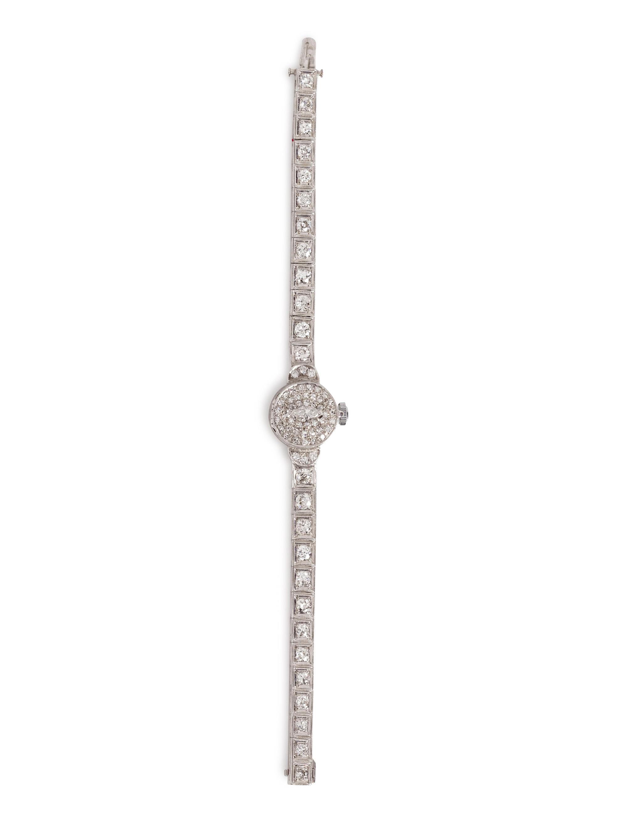 A 14 Karat White Gold and Diamond Surprise Wristwatch, Tessco,