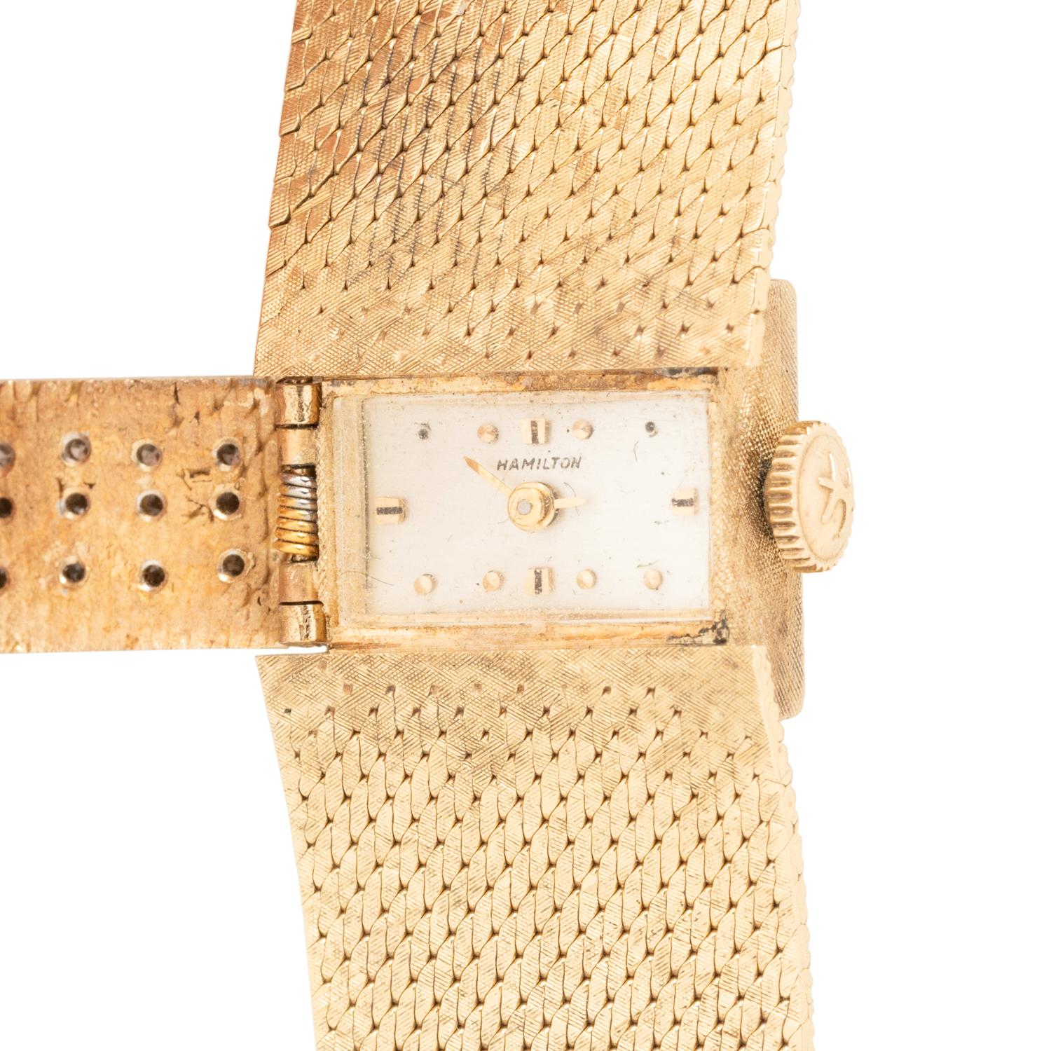 HAMILTON, YELLOW GOLD AND DIAMOND HIDDEN DIAL WATCH