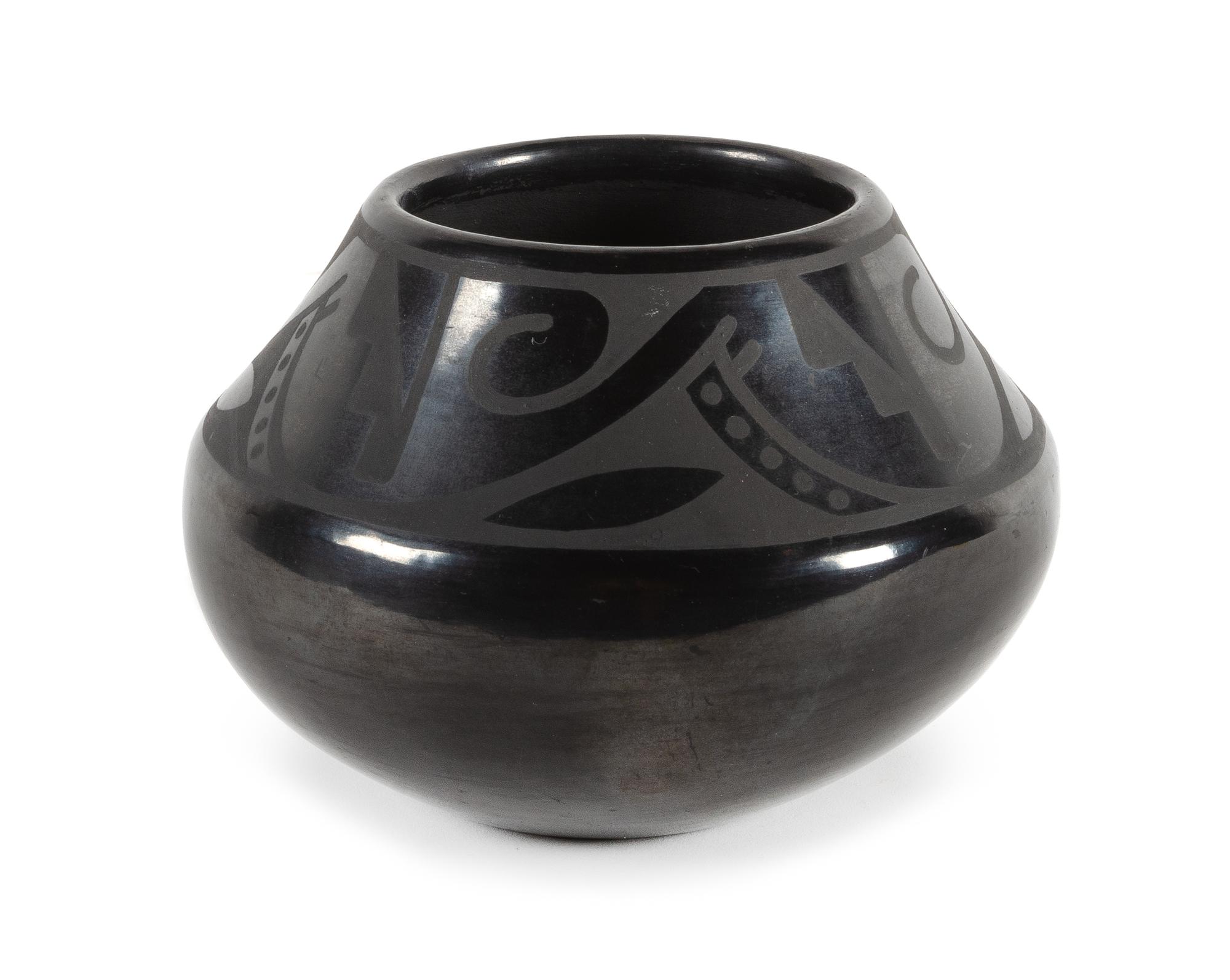 Maria Martinez and Popovi Da Height 4 1/2 x diameter 5 1/2 inches — (San Illfefonso, 1887-1980, 1922-1971)