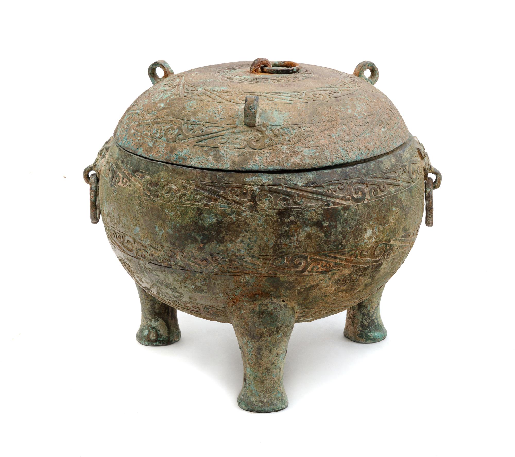 A Chinese Bronze Tripod Covered Vessel, Ding