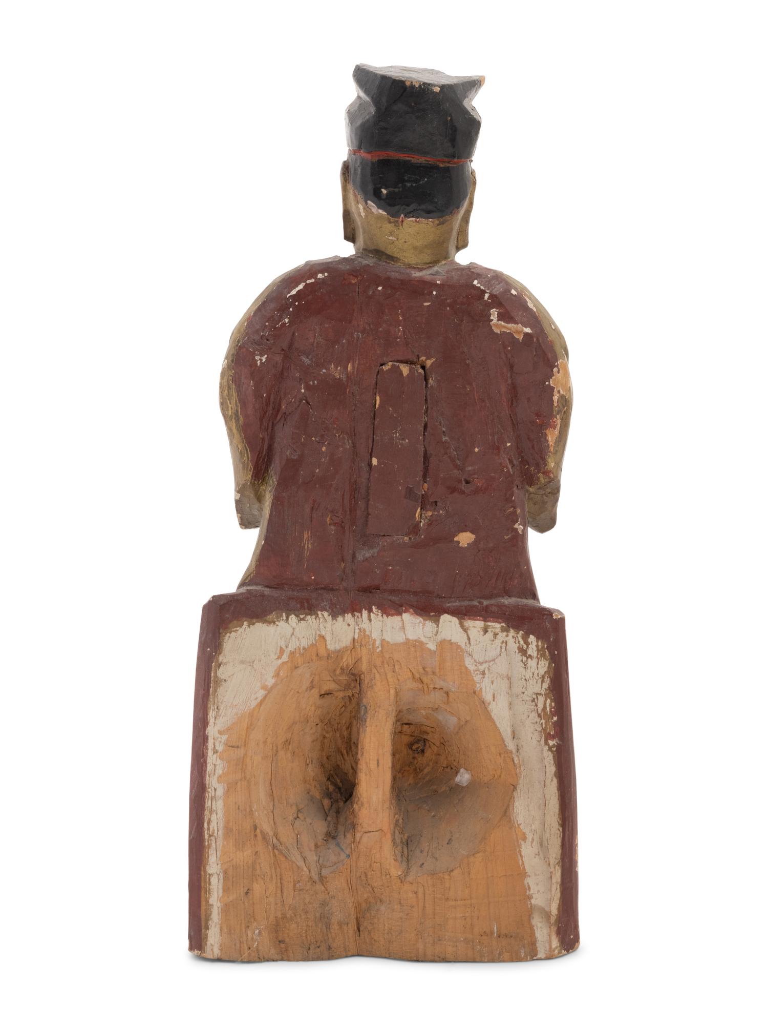 A Chinese Carved Polychrome Decorated Figure