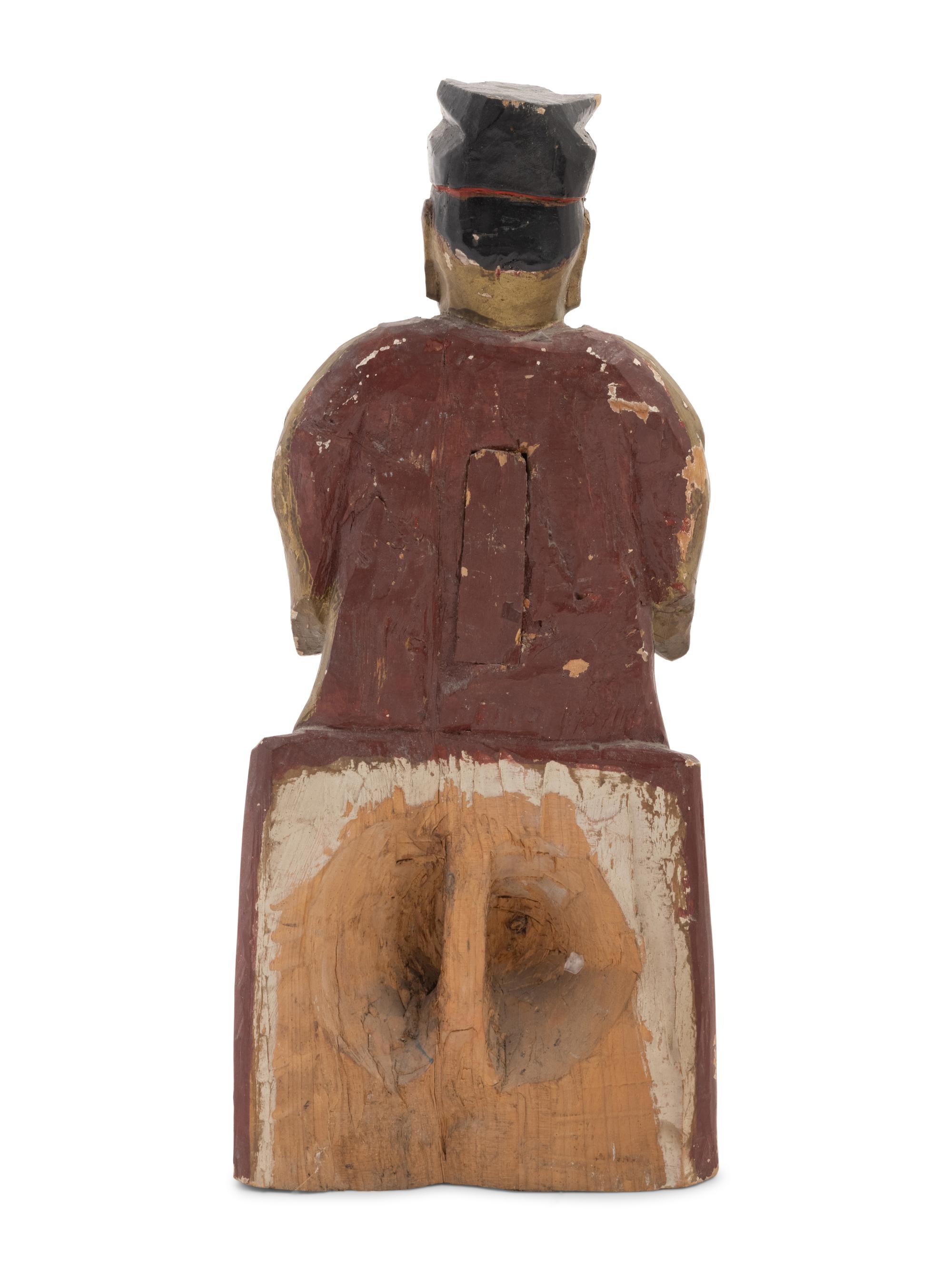 A Chinese Carved Polychrome Decorated Figure