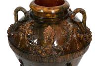Italian Brown Glazed Ceramic Amphora in an Iron Stand