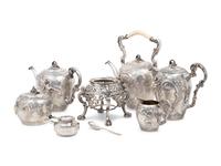 A Rare German Silver Two-Tier Tea Table with Matching Five-Piece Tea Service and Two Trays
