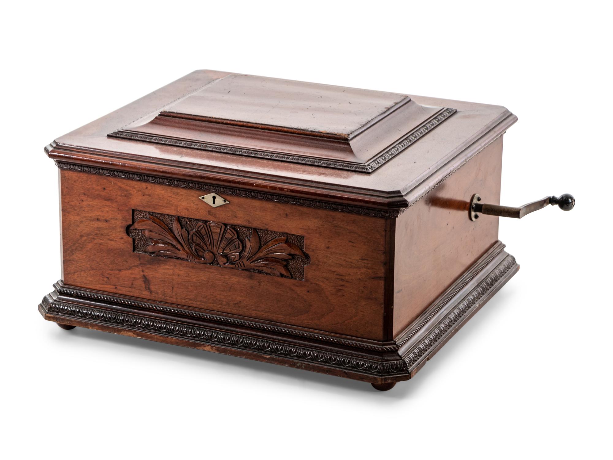 A Criterion Walnut Music Box with Ten Discs