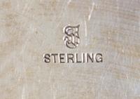 An American Silver Charger, Towle Silversmiths, Newburyport, MA, with raised EMW monogram.
