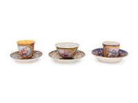 An Assembled Set of Six Sèvres Style Painted and Parcel Gilt Porcelain Teacups and Saucers