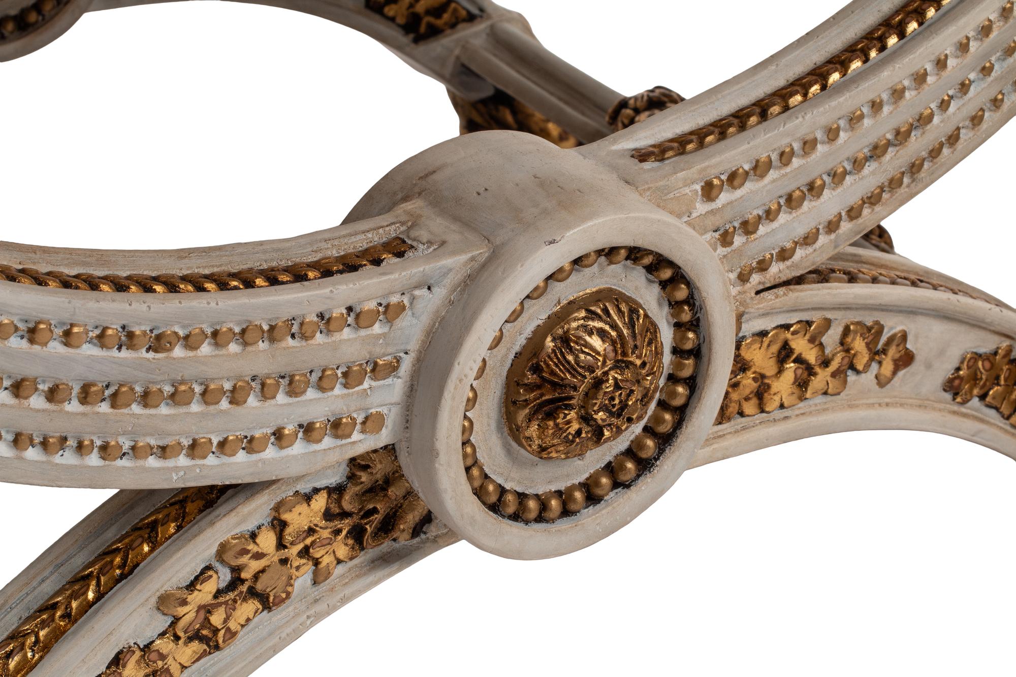 A Pair of Continental Painted and Parcel Gilt Curule-Form Tabourets