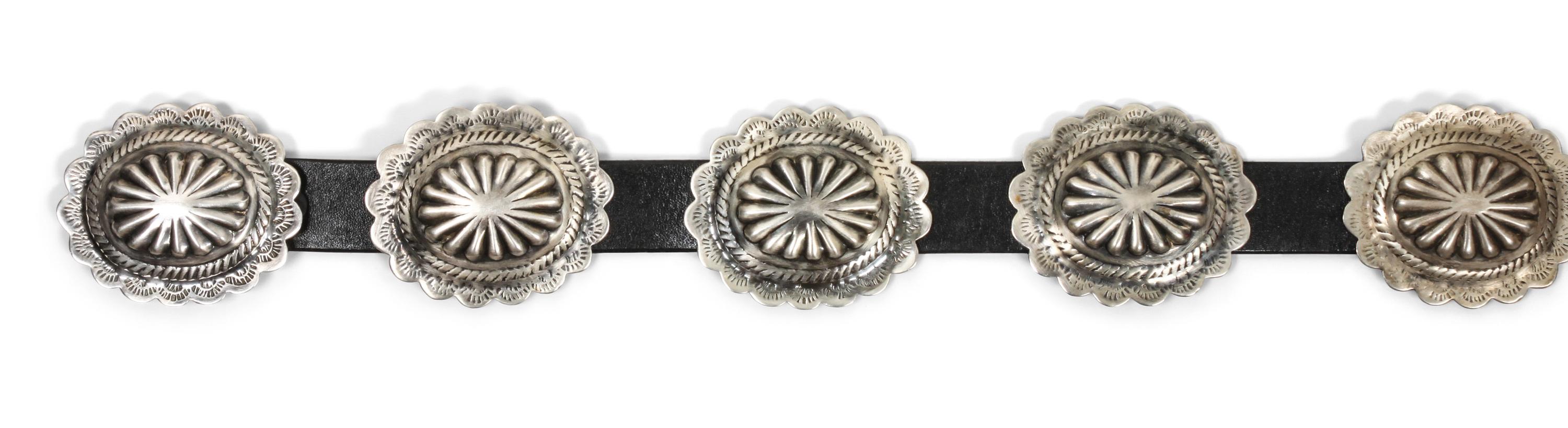 A Navajo Concho Belt Length 45 inches, height of buckle 2 14/ x width 2 3/4 inches.