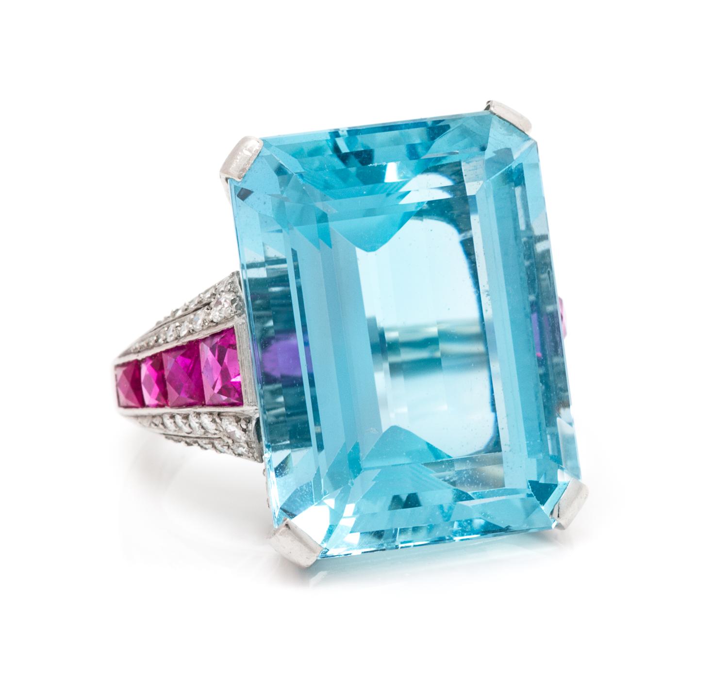 A Platinum, Aquamarine, Ruby and Diamond Ring, British, 9.70 dwts.