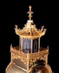 A Chinese Ormolu Quarter-Striking, Musical and Automaton 'Acrobat' Mantel Clock
