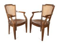 A Pair of Italian Caned Armchairs