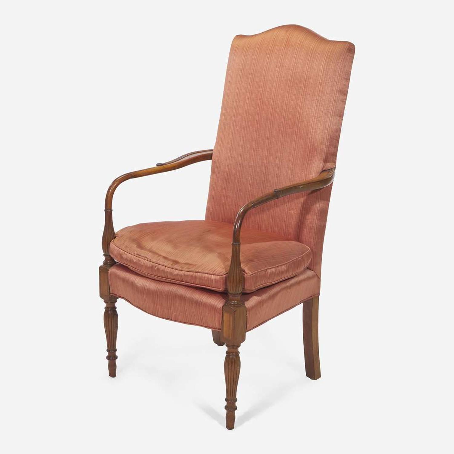 A Federal style carved and inlaid mahogany lolling chair