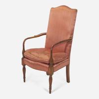 A Federal style carved and inlaid mahogany lolling chair