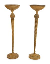 A Pair of Painted Metal and Carved Wood Torchere Style Floor Lamps