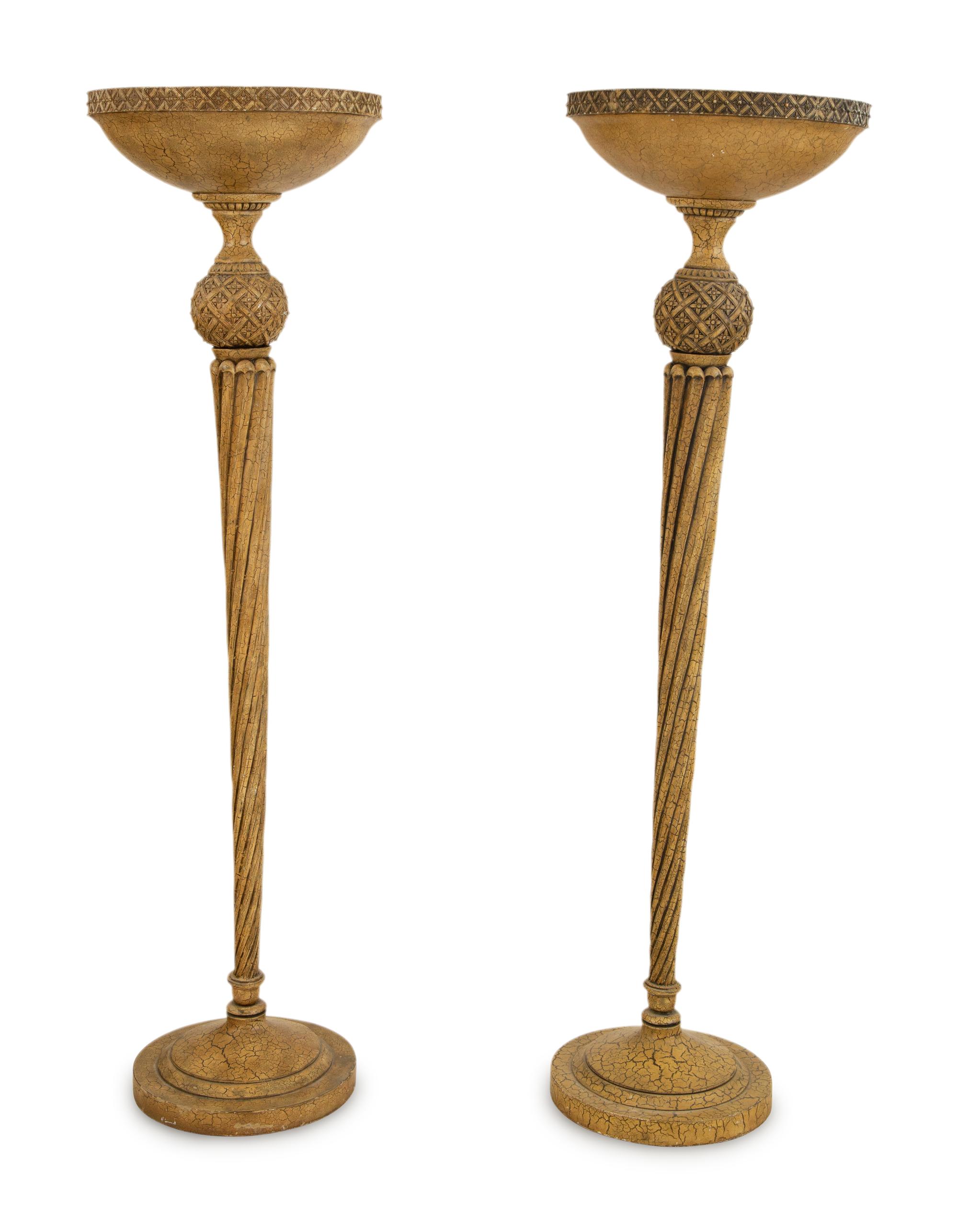 A Pair of Painted Metal and Carved Wood Torchere Style Floor Lamps