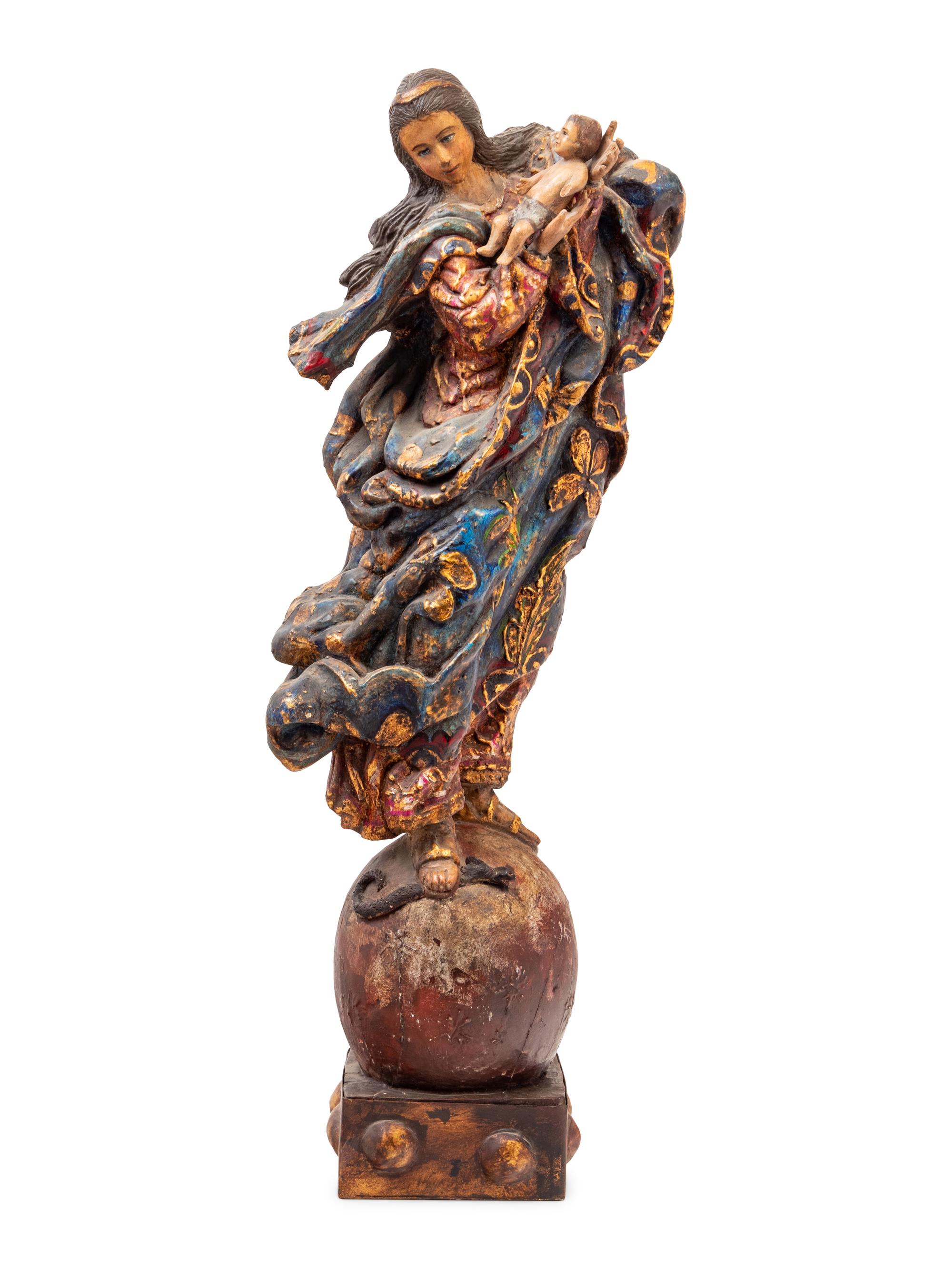 A Continental Carved, Polychromed and Parcel Gilt Figural Group