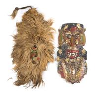 Two Ethnographic Masks Height of latter 27 inches.
