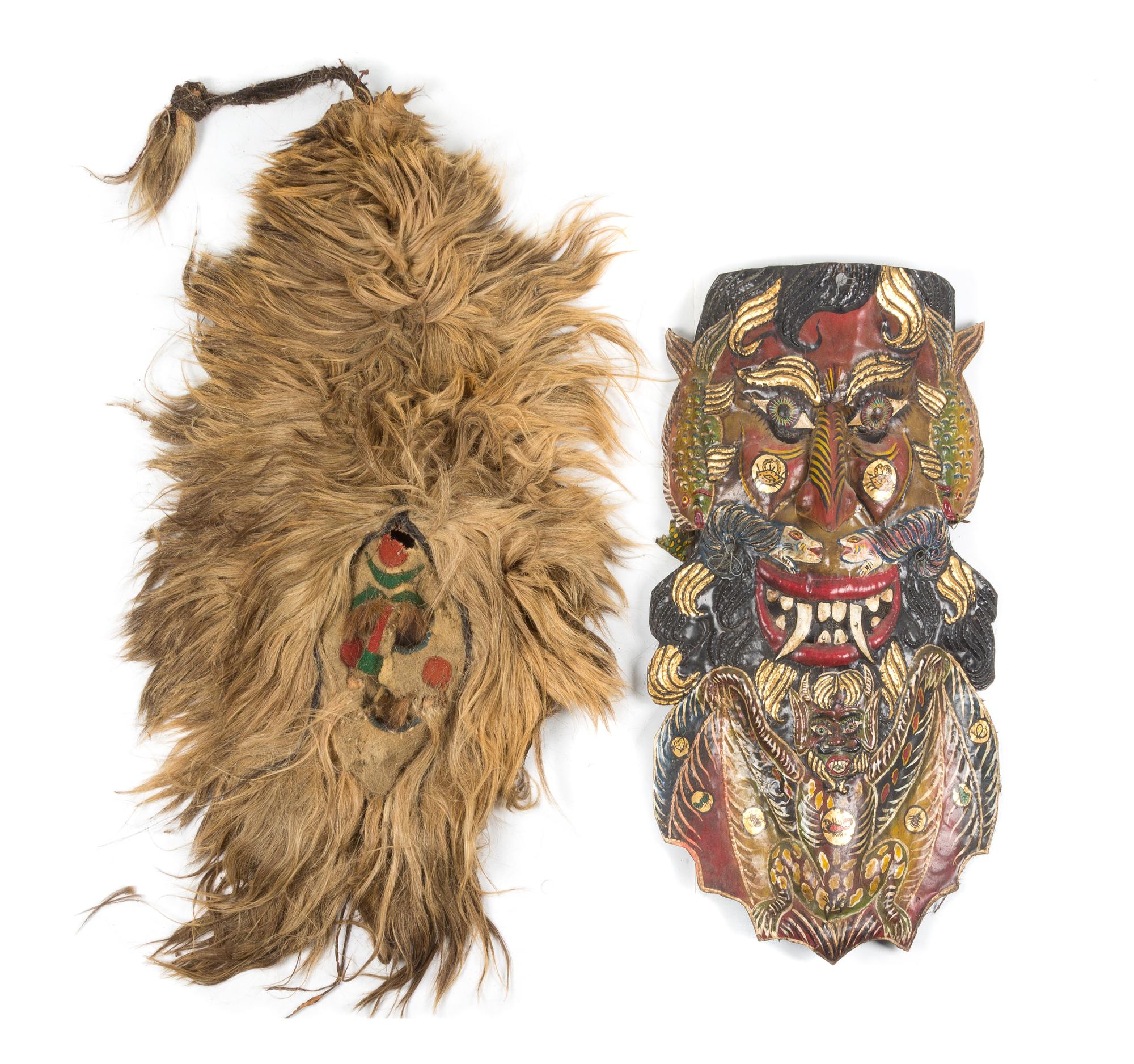 Two Ethnographic Masks Height of latter 27 inches.