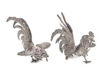 A Pair of German Silver Figures of Fighting Cockerels